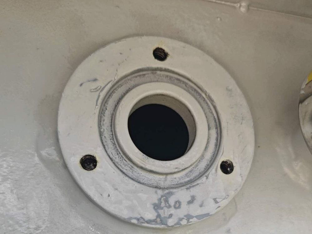 Gas filling port flange after cleaning and re-sealing